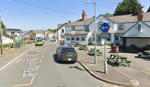 View of the bus stop outside the pub